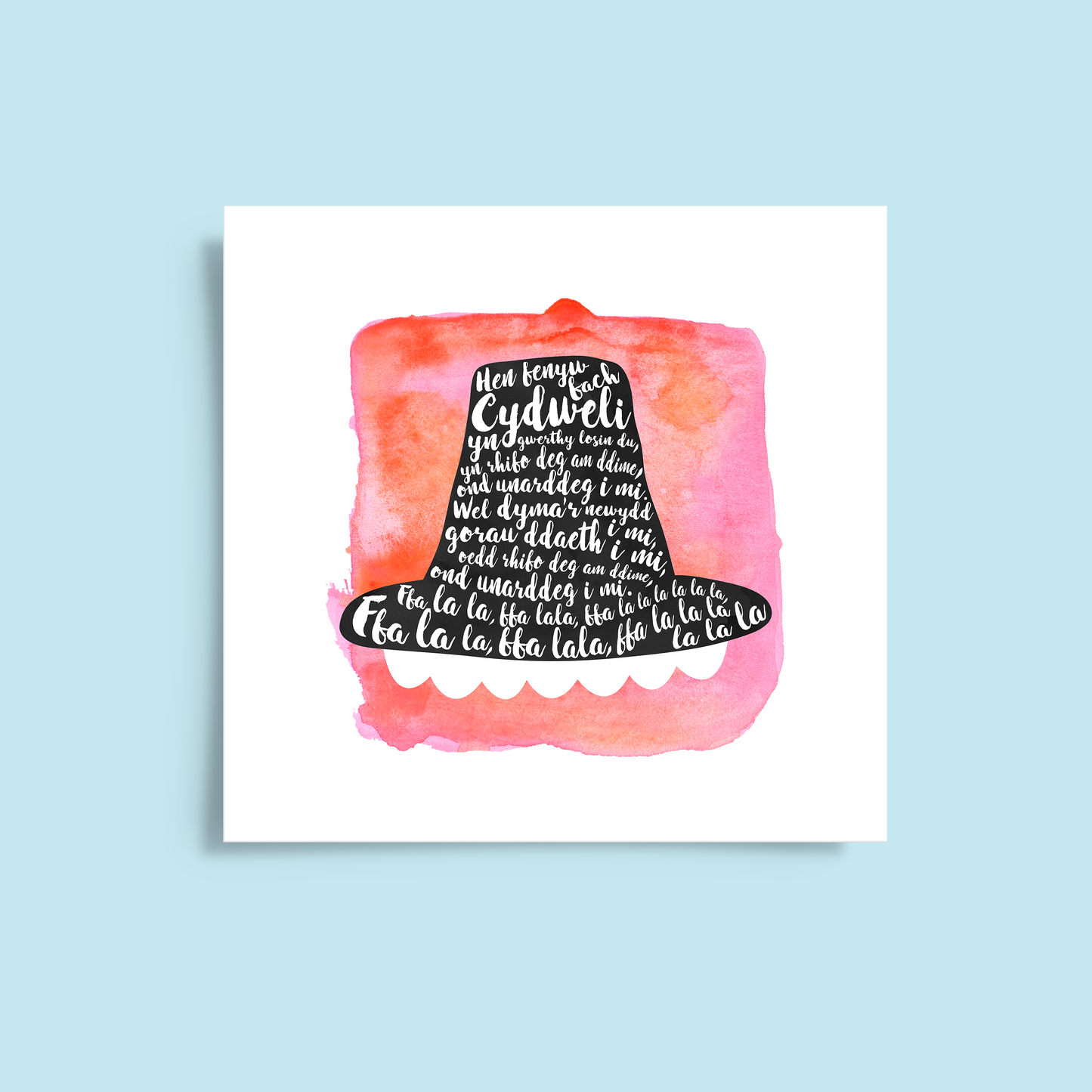 A tribute to one of Wales’ most beloved songs, this print features Hen Fenyw Bach lyrics in a Het Gymreig 'Welsh Hat' red watercolour design.