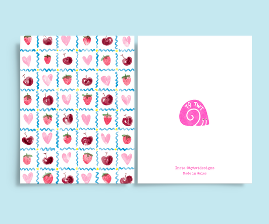 Featuring a hand illustrated grid of strawberries, cherries, hearts, squiggles, and stars. Back of card Instagram @tytwtdesigns made in Wales