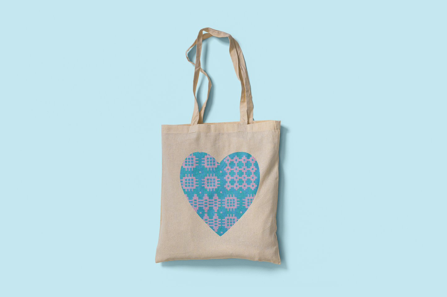 Fair trade cotton tote bag with blue and lilac Welsh blanket heart design printed on both sides. Ethically made and eco-friendly