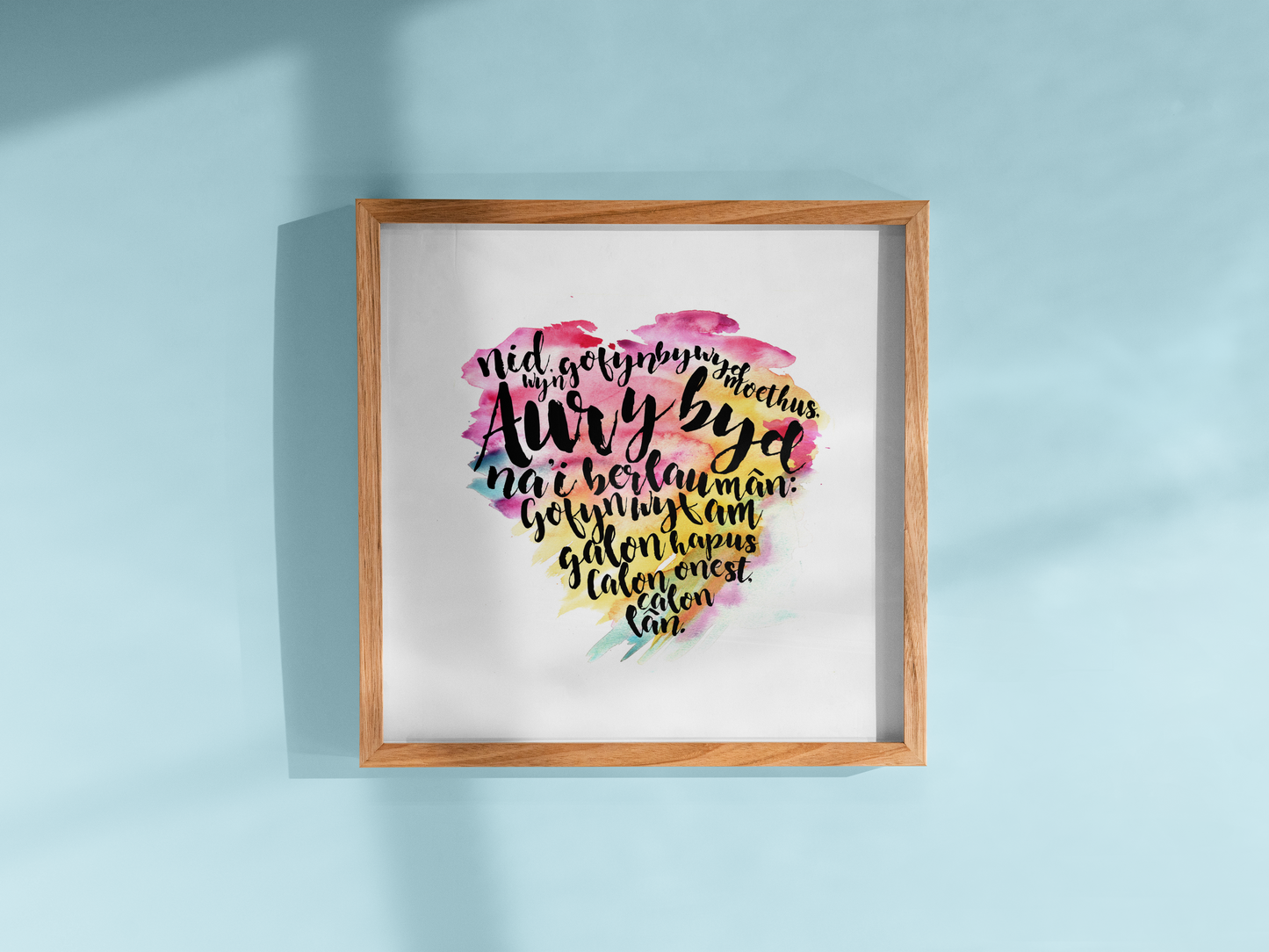 Add a touch of Welsh heritage to your home with this rainbow watercolour print of Calon Lân lyrics. A vibrant and meaningful tribute to a beloved song, ethically made in Wales. Perfect for gifts or your own space