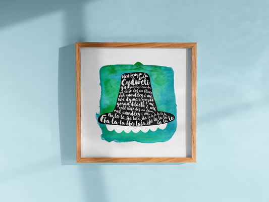 A tribute to one of Wales’ most beloved songs, this print features Hen Fenyw Bach lyrics in a Het Gymreig 'Welsh Hat' blue watercolour design.
