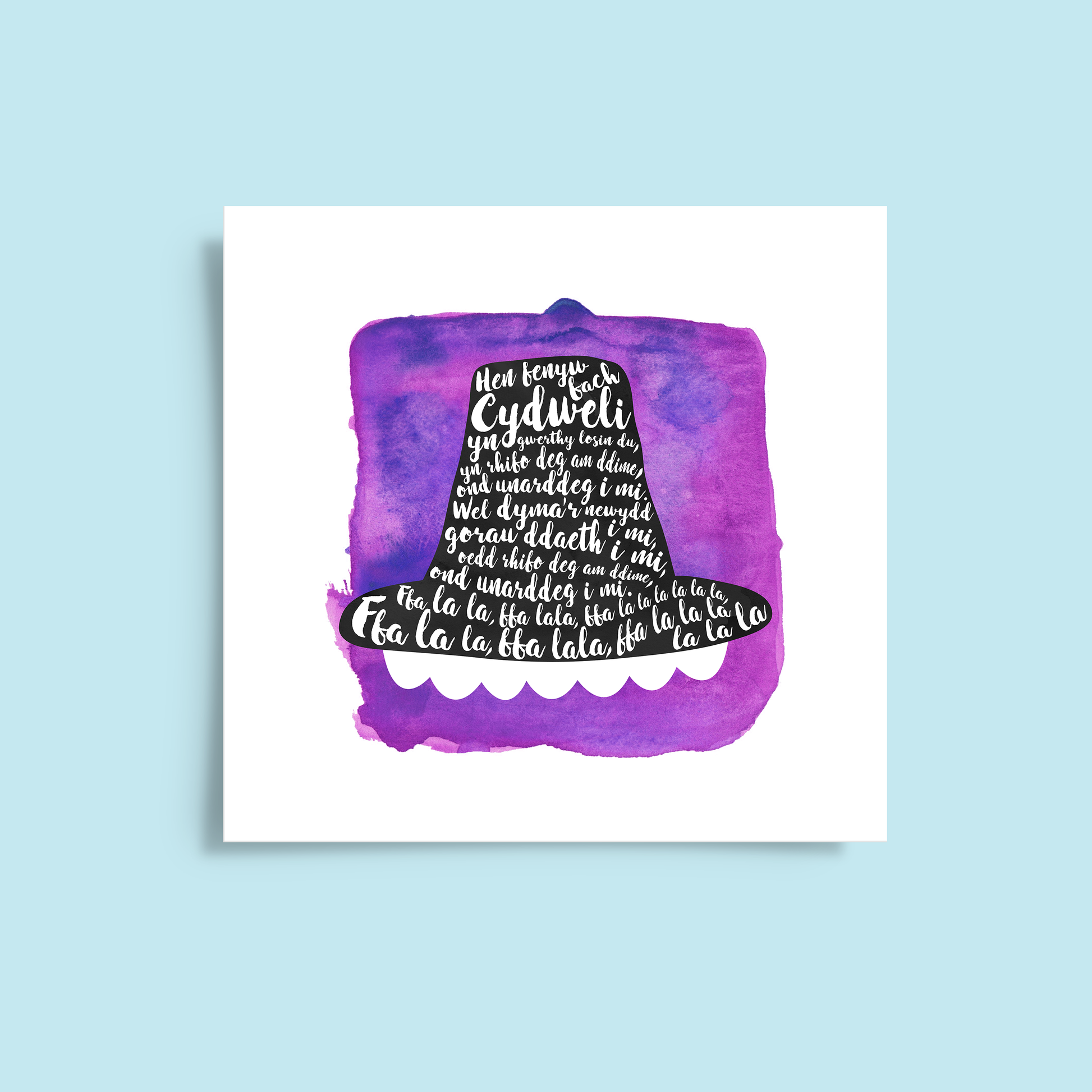 A tribute to one of Wales’ most beloved songs, this print features Hen Fenyw Bach lyrics in a Het Gymreig 'Welsh Hat' pruple watercolour design.