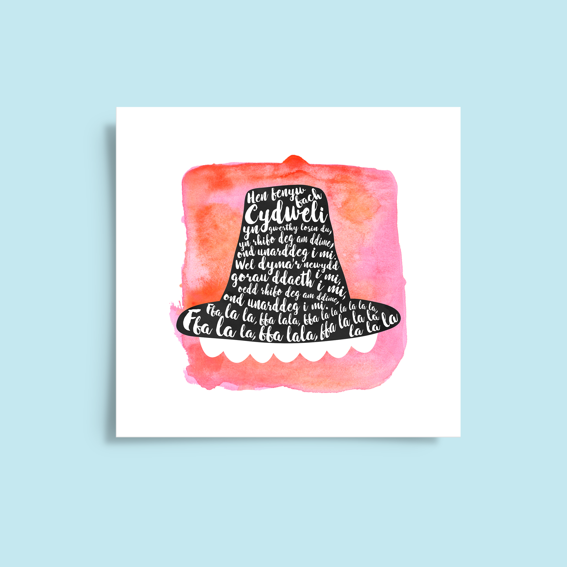 A tribute to one of Wales’ most beloved songs, this print features Hen Fenyw Bach lyrics in a Het Gymreig 'Welsh Hat' red watercolour design.