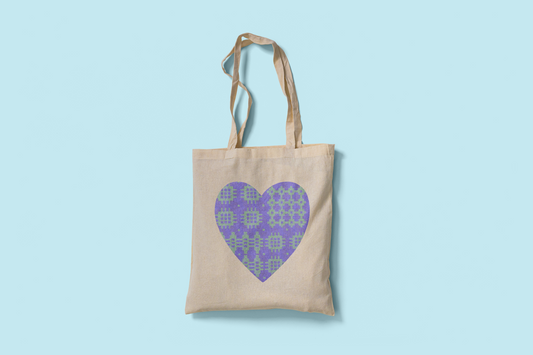 Fair trade cotton tote bag with blue and lilac Welsh blanket heart design printed on both sides. Ethically made and eco-friendly