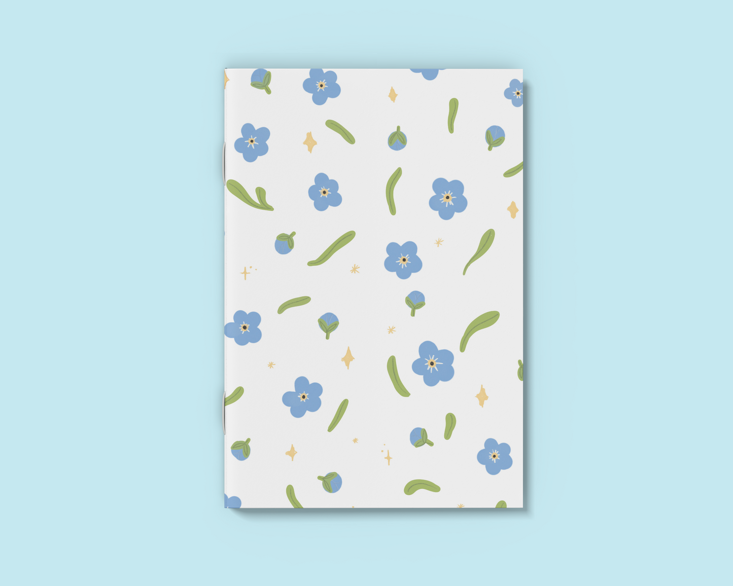 Forget-Me-Nots A6 notebook with delicate floral cover and blank pages inside, ideal for journaling
