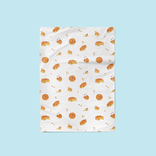Hand-drawn Welsh cake pattern printed on fair trade cotton kitchen towels.